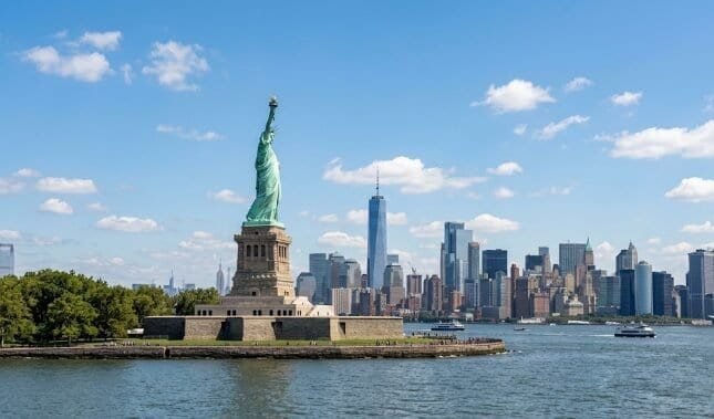 Statue of Liberty with New York City skyline in the background
